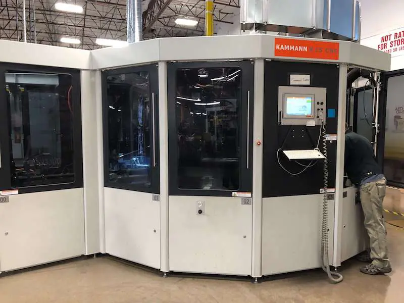 Kammann K15 CNC screen-printing equipment in action. | NW Rapid Manufacturing SLS 3D printing solutions